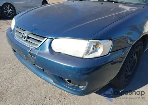 2001 Toyota Corolla Ce z USA, uszkodzony, nr VIN 1NXBR12E31Z502553